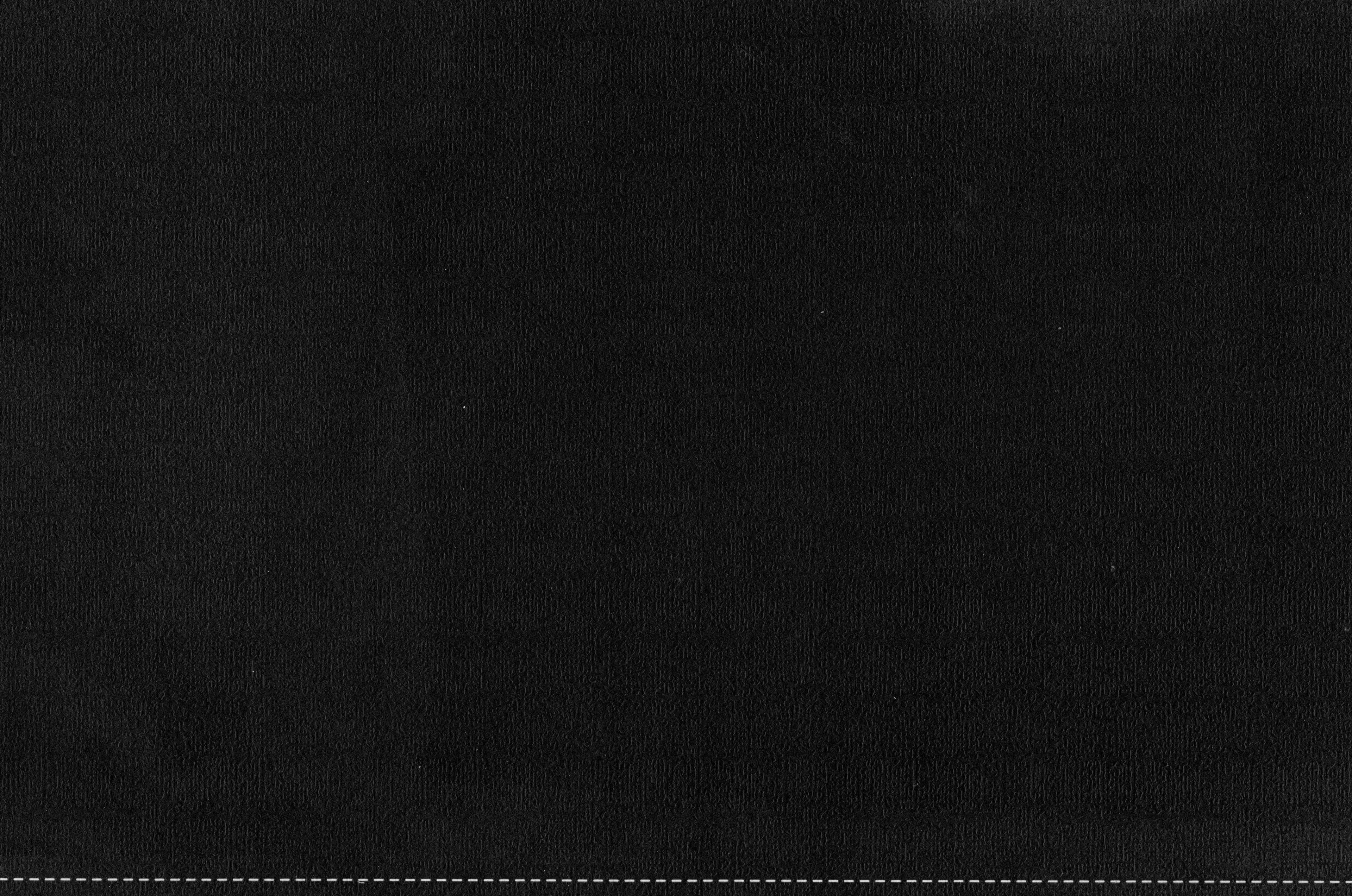 Crumpled paper background texture dark